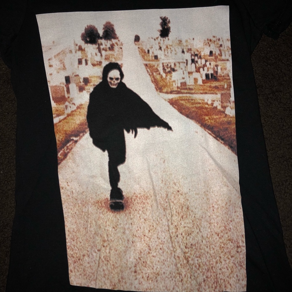 Black skateboarding skeleton t shirt.